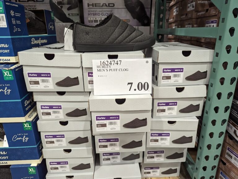 Costco clearance sign with an asterisk and an even-dollar 7.00 markdown price on Hurley clogs